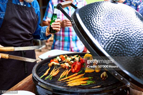 close up of vegetables cooking on barbecue - al fresco dining stock pictures, royalty-free photos & images