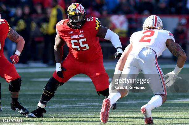 Derwin Gray of the Maryland Terrapins blocks Chase Young of the Ohio State Buckeyes at Maryland Stadium on November 17, 2018 in College Park,...