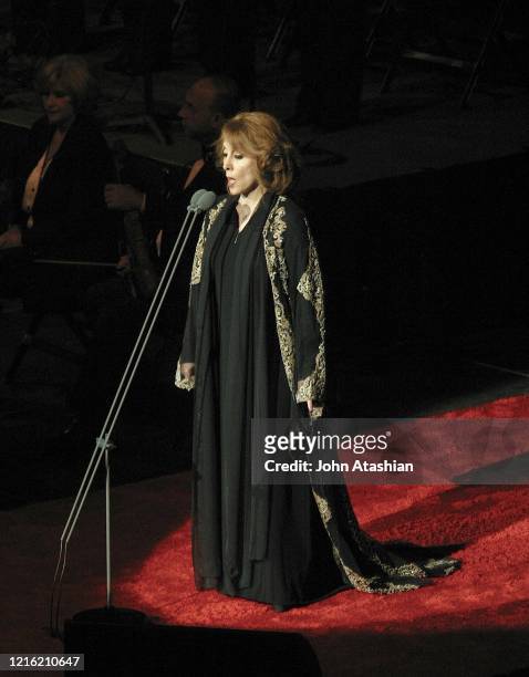 Lebanese singer Fairouz, born Nouhad Haddad, is shown performing on stage during a "live"concert appearance on October 11, 2003.