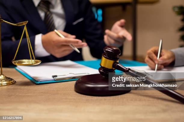 business people and lawyer or judge team discussing co-investment conference, concepts of law, advice, legal services. - bemiddeling stockfoto's en -beelden