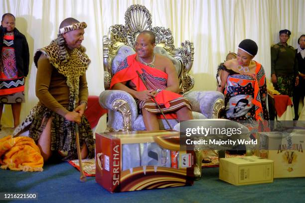 The groom presents gifts to King Mswati III. Historically, gifting happens on the final leg of the traditional Swazi wedding, which is a separate...