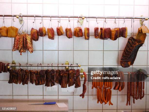 smoked ham and sausages - butcher stock-fotos und bilder