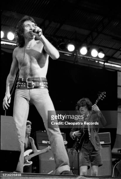 Bon Scott, Mark Evans, Angus Young from the rock band AC/DC Live at Reading Festival In Reading, UK August 29, 1976