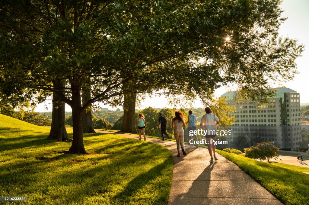 People exercise and run in a public park in Nashville Tennessee USA