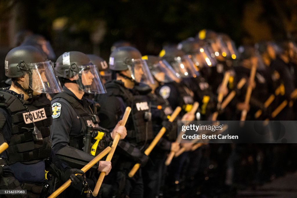 Recent Police Riot Police in riot gear stand in formation during protests on May 29 ...