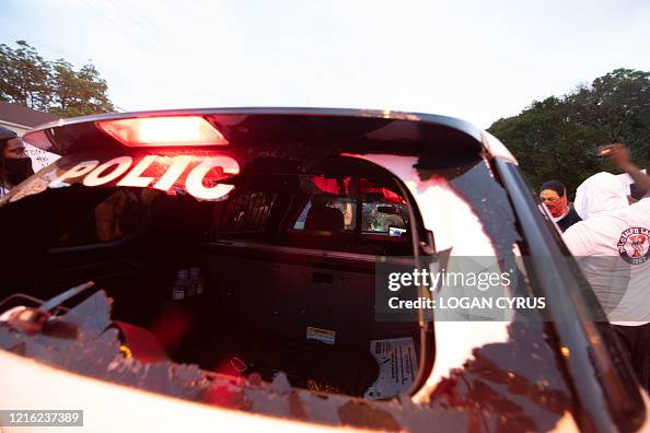 Cmpd Cruiser Protestors gather around a CMPD cruiser with the back window... News ...
