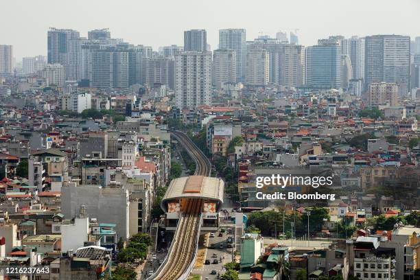 The Cat Linh station, center, stands among buildings in Hanoi, Vietnam, on Friday, May 29, 2020. Vietnam inflation cooled for a fourth consecutive...