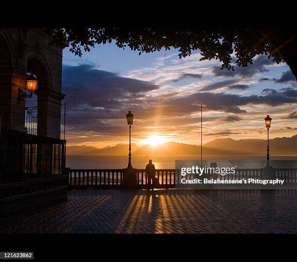 man and sunrise - at bejaia algeria stock pictures, royalty-free photos & images