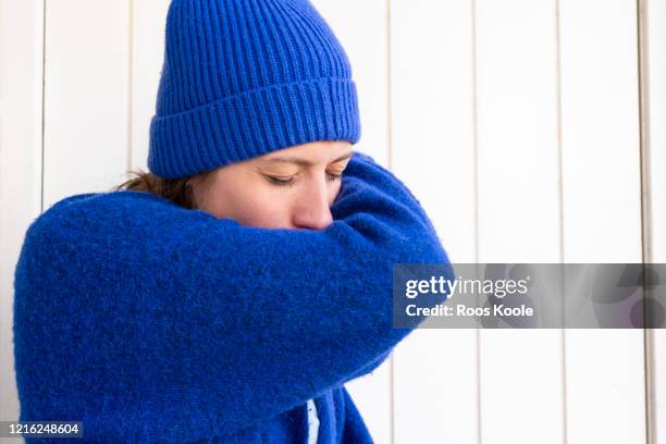 having a cold - woman cough stock-fotos und bilder