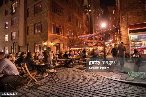historic bars and restaurants on stone street manhattan new york - new york state fair stock pictures, royalty-free photos & images