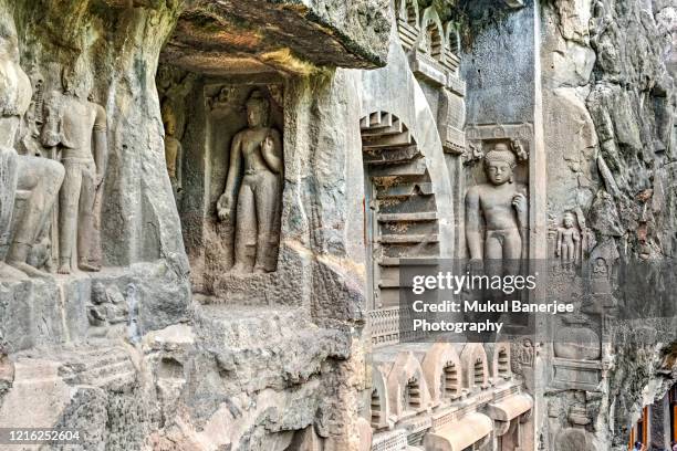 an outside view of one of the caves in ajanta decorated with buddhist art, near aurangabad in the state of maharashtra, india - ellora stock-fotos und bilder