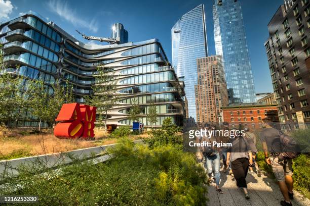 city view from the high line elevated walkway park in manhattan new york - high line stock pictures, royalty-free photos & images