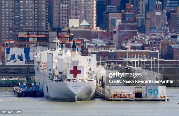 View of the USNS Comfort at the Pier 90 on April 1, 2020 in New York City. The Comfort, a naval hospital ship, is equipped to take in patients within...