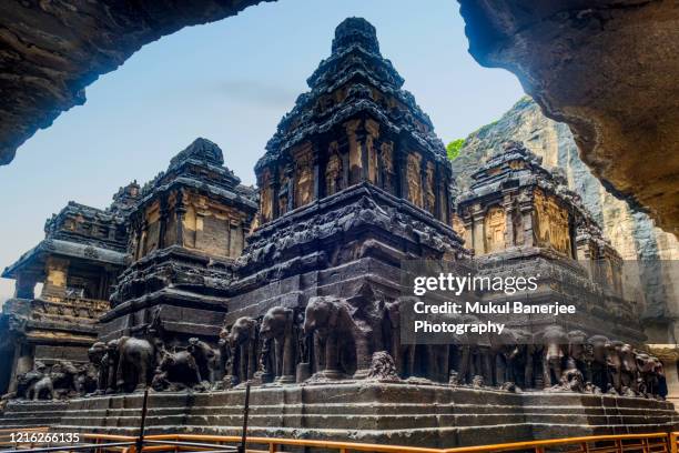 the kailasa (kailasanatha) temple is one of the largest rock-cut ancient hindu temples and is one of the 34 cave (cave 16) temples and monasteries. ellora, maharashtra, india - ellora stock pictures, royalty-free photos & images