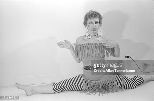 Portrait of American fashion designer Betsey Johnson as she does the 'splits' in her studio, New York, New York, July 9, 1980.