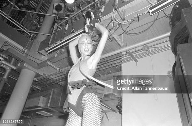 View of an unidentified model on the catwalk during a show of Betsey Johnson's fashions, New York, New York, November 5, 1980.