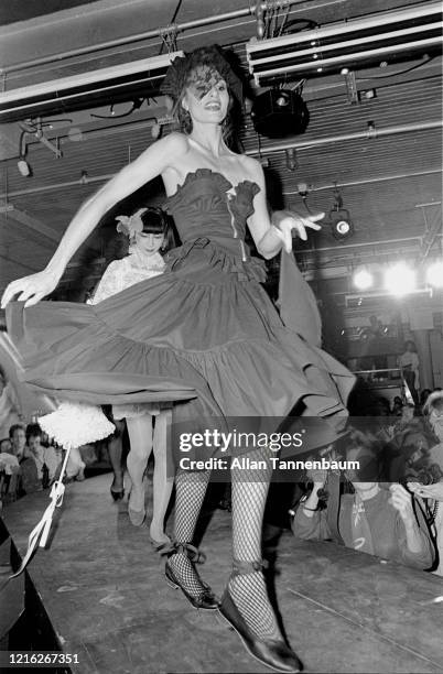 View of an unidentified model on the catwalk during a show of Betsey Johnson's fashions, New York, New York, November 5, 1980.