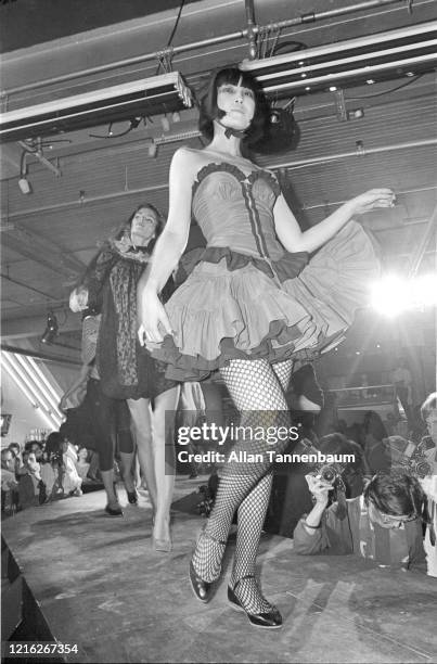 View of an unidentified model on the catwalk during a show of Betsey Johnson's fashions, New York, New York, November 5, 1980.