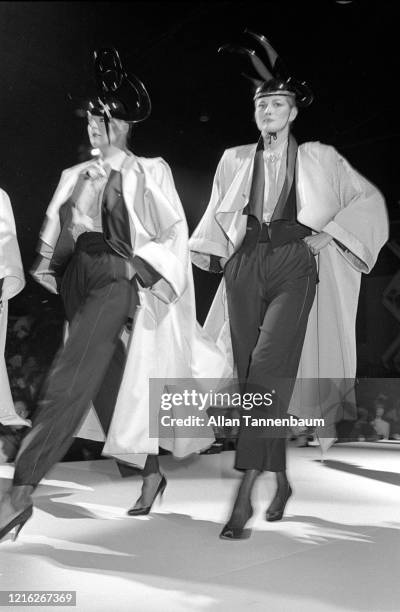 View of unidentified models on the catwalk during the Claude Montana fashion show at Bond's , New York, New York, September 9, 1981.