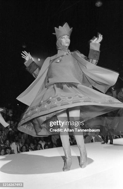 View of an unidentified model on the catwalk during the Claude Montana fashion show at Bond's , New York, New York, September 9, 1981.