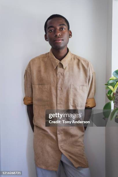 portrait of young man in suede shirt - tan suede stock pictures, royalty-free photos & images