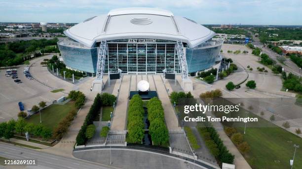 An aerial drone view of AT&T Stadium, where the Dallas Cowboys NFL football team plays, on April 01, 2020 in Arlington, Texas. The NBA, NHL, NCAA and...