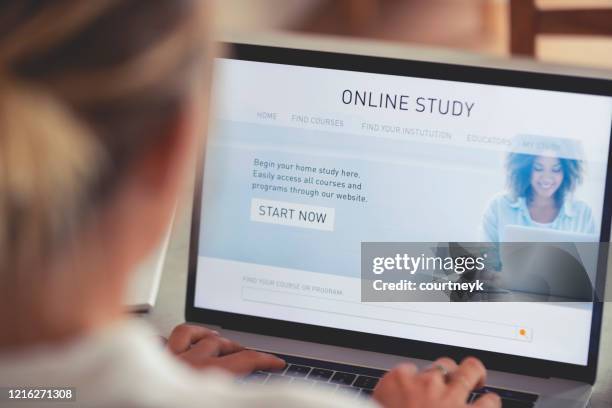person working on an online study website. - online course stock pictures, royalty-free photos & images
