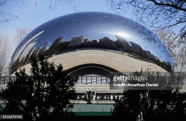 The sculpture "Cloudgate," also known as "The Bean," is closed to the public at Millennium Park along Michigan avenue until further notice during the...