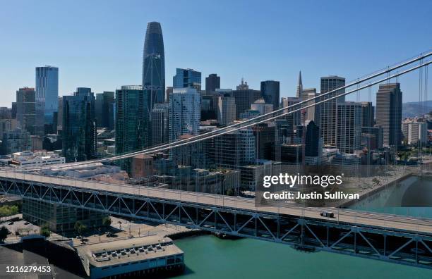 California Highway Patrol car drives across the San Francisco – Oakland Bay Bridge on April 01, 2020 in San Francisco, California. Officials in seven...