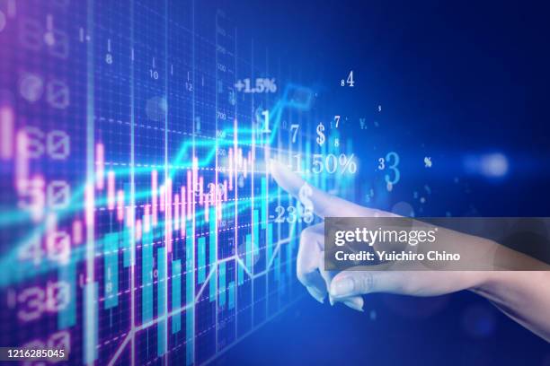 woman touching stock market financial growth chart - aandelen beurs stockfoto's en -beelden