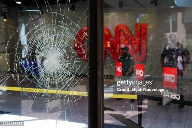 Damage is seen to CNN Center following an overnight demonstration over the Minneapolis death of George Floyd while in police custody on May 30, 2020...