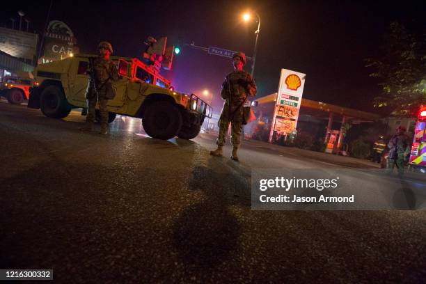 Minnesota MAY 29, 2020The National Guard blocks the road as protesters gather on the corner of Lake street and Park Ave. On Friday night, May 29,...