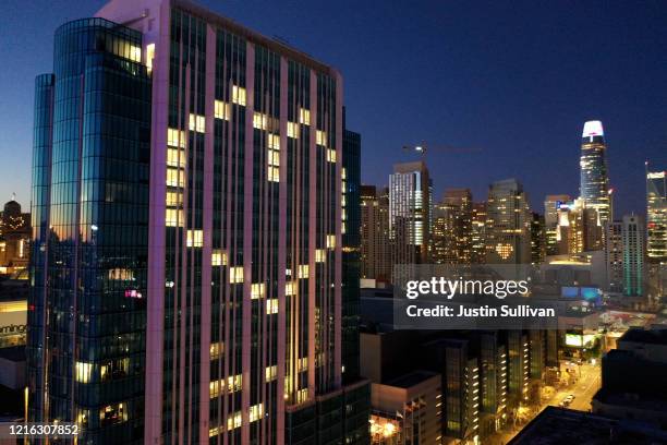 Window lights are illuminated in the shape of a heart at the InterContinental San Francisco Hotel on April 01, 2020 in San Francisco, California....