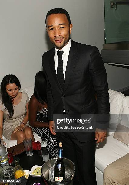 John Legend attends the Sade/John Legend Concert Official After Party sponsored by MARTINI Moscato d'Asti at Cafe Entourage on August 20, 2011 in...