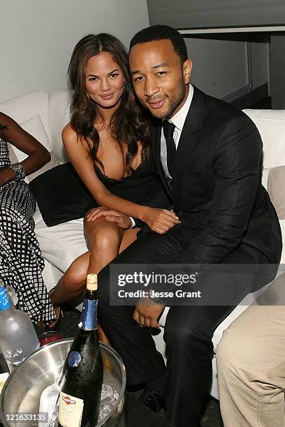 Christine Teigen and John Legend attend the Sade/John Legend Concert Official After Party sponsored by MARTINI Moscato d'Asti at Cafe Entourage on...