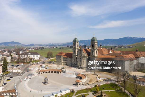 aerial view of the abbey in einsiedeln in canton schwyz in central switzerland - abadia mosteiro - fotografias e filmes do acervo