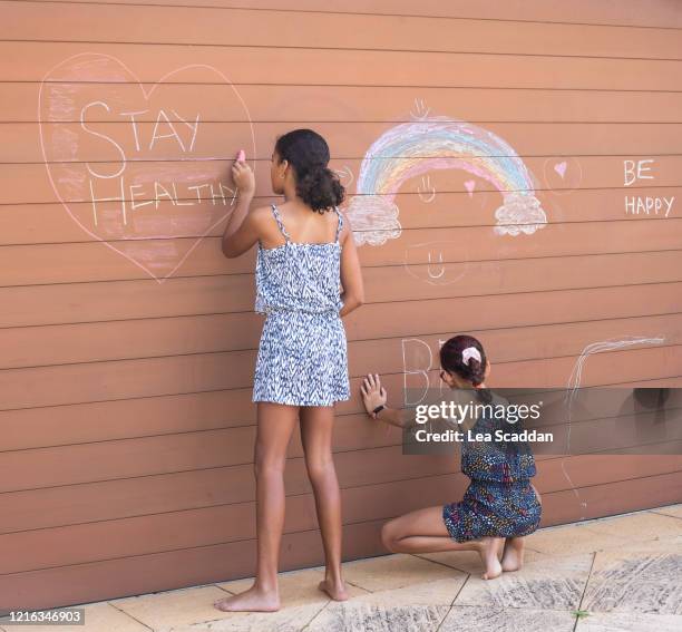 healing time during the covid-19 crisis - family chalk drawing stock pictures, royalty-free photos & images