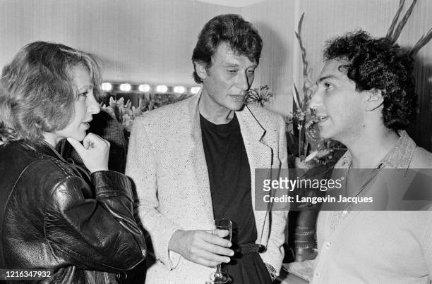 Johnny Hallyday et Nathalie Baye sont venus assister à la première du concert de France Gall au Zénith de Paris. Ici avec le mari de la chanteuse :...