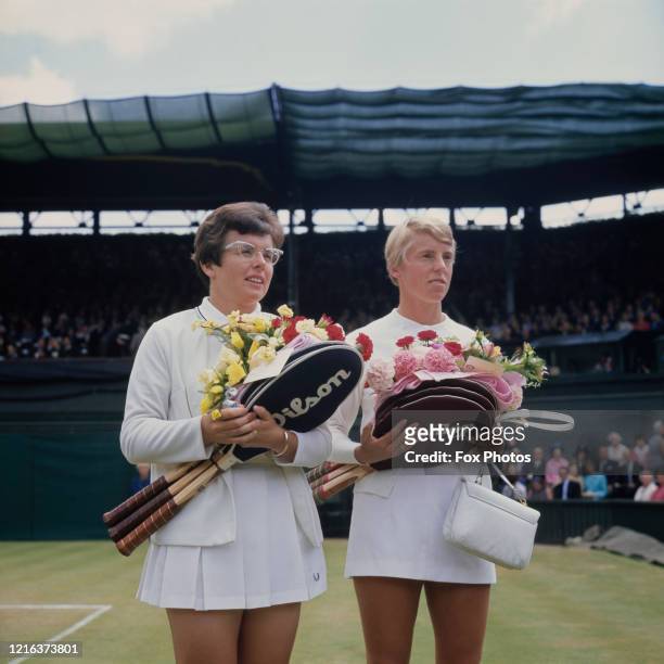 Billie Jean King of the United States and Ann Jones of Great Britain pose for photographs before the start of their Women's Singles Final match at...