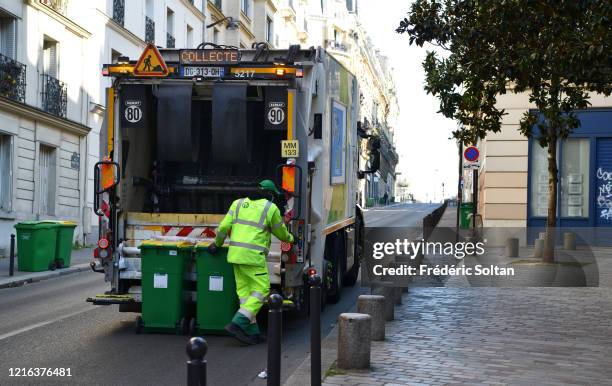 Street cleaning workers in the neighborhood of "Gobelins" during the confinement of the French due to an outbreak of the coronavirus on April 02,...