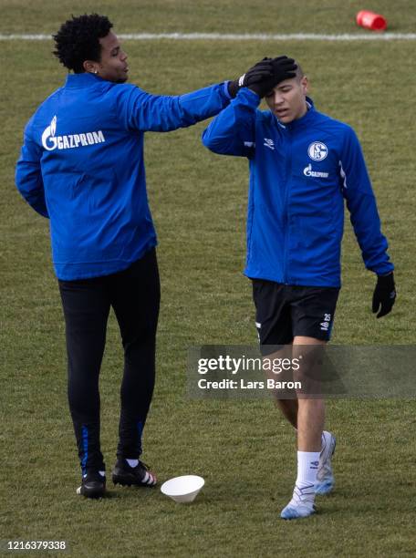 Jokes with Amine Harit during a training session at FC Schalke 04 training ground on April 02, 2020 in Gelsenkirchen, Germany. Due to COVID-19,...