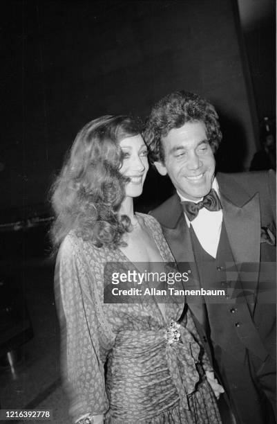 Married American couple, actress and model Marisa Berenson and businessman James Randall, attend the Glory of Russian Costume Exhibition, held in the...