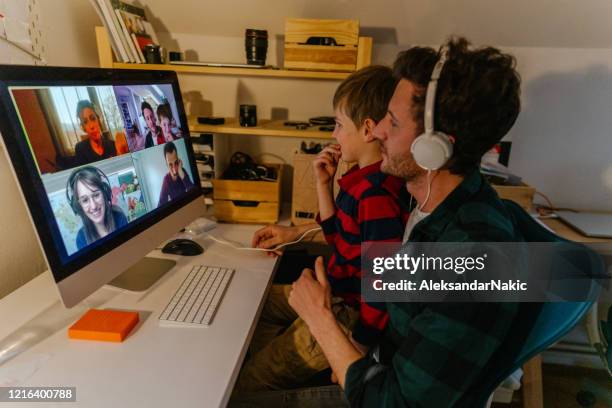 having a video call with friends - social distancing kids stock pictures, royalty-free photos & images