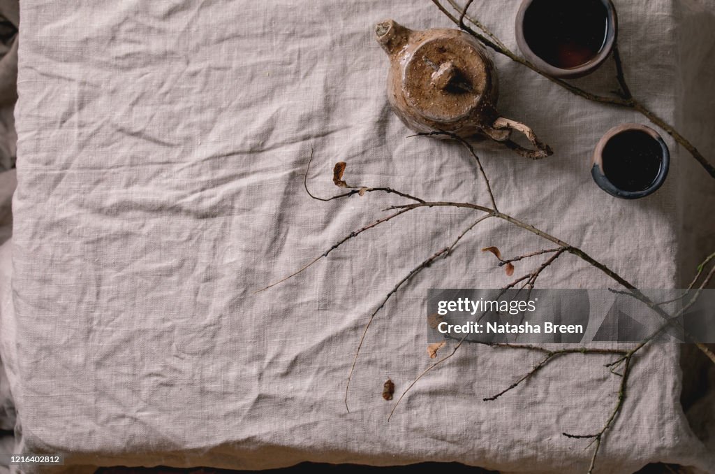 Teapot and clay cups