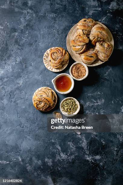 swedish cardamom buns kanelbulle - brioche stock pictures, royalty-free photos & images