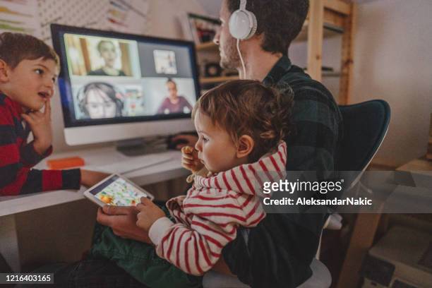 having a video conference call from home - millennial generation stock pictures, royalty-free photos & images