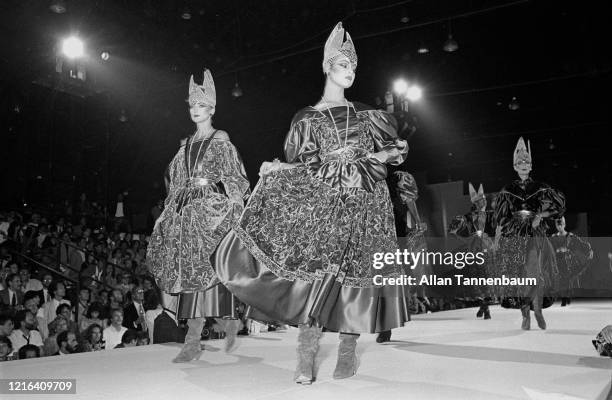 View of unidentified models on the catwalk during the Claude Montana fashion show at Bond's , New York, New York, September 9, 1981.