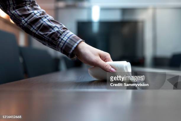 cleaning table surface - rubbing stock pictures, royalty-free photos & images