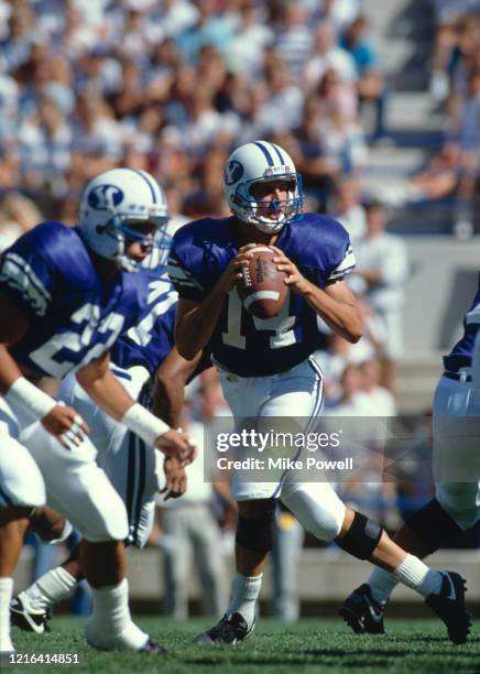 Ty Detmer, Quarterback for the Brigham Young University Cougars during the NCAA Western Athletic Conference college football game against the San...