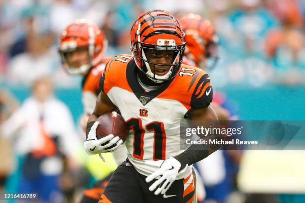 John Ross of the Cincinnati Bengals in action against the Miami Dolphins during the second quarter at Hard Rock Stadium on December 22, 2019 in...